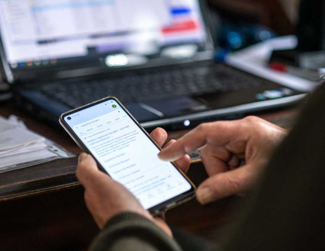 Person using their mobile phone